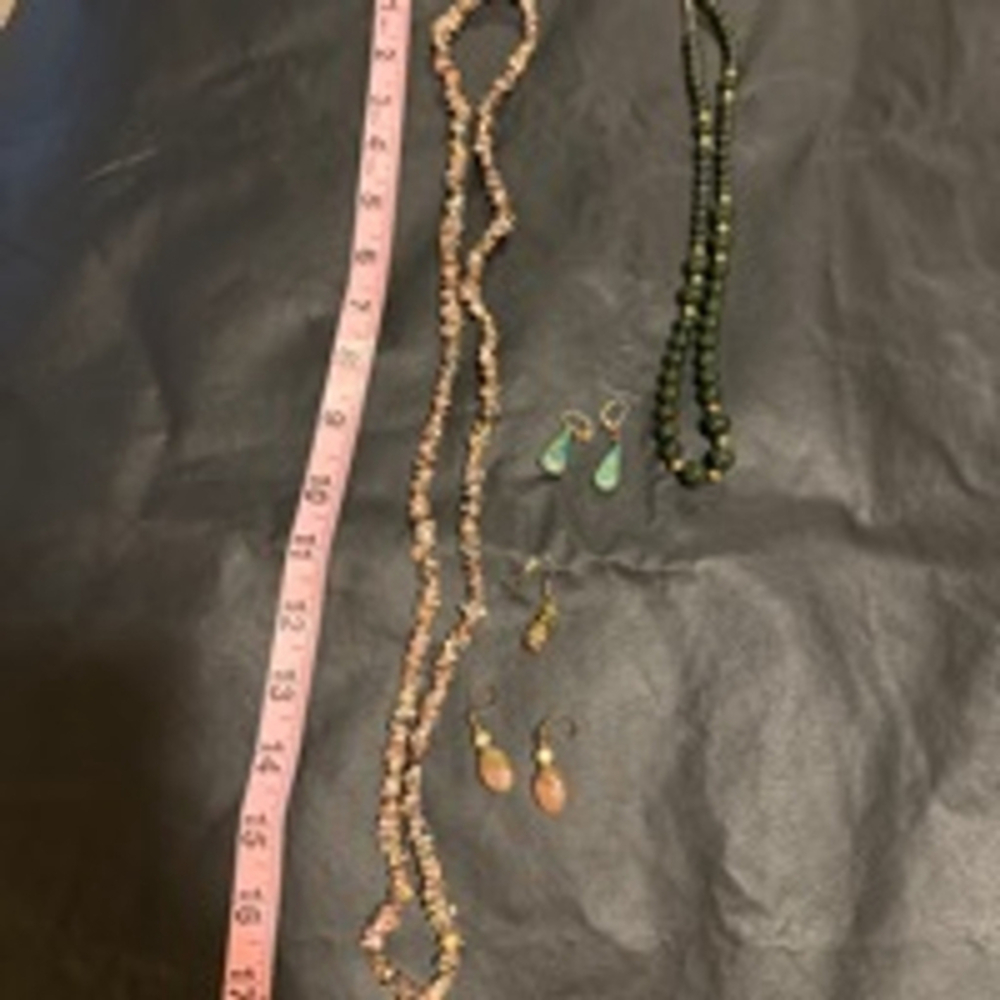 2 stone necklaces and 2 stone earrings plus 1 single earring